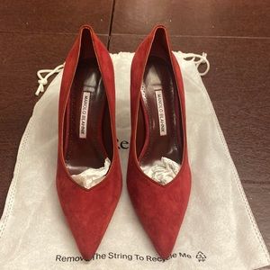 Brand New, never worn, Manolo Blahnik rust colored suede pumps.